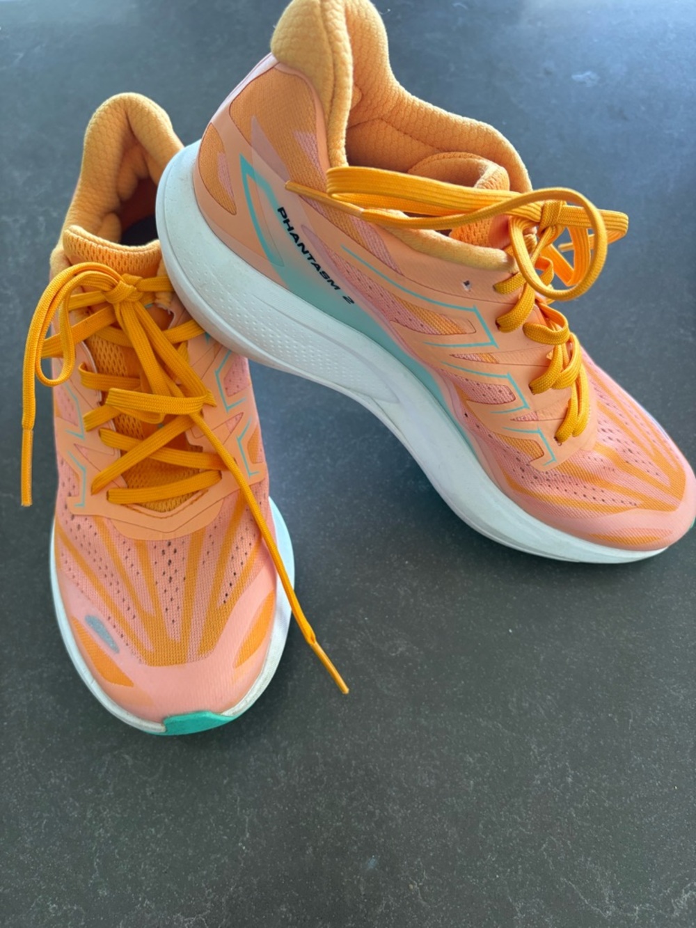 Salomon Women’s Peach and Teal Athletic Running Shoes